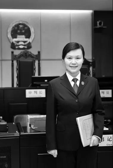 1621414168210125.jpg 周春梅.jpg